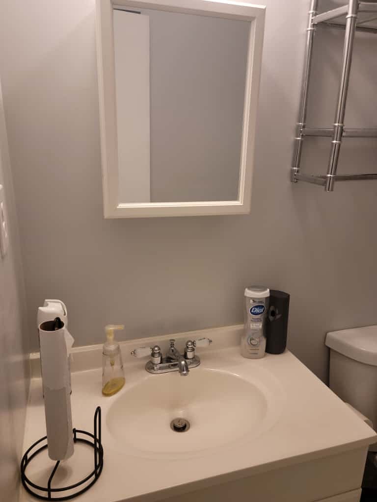 Clean, modern bathroom shared with one respectful professional  well-kept and stocked with daily essentials.