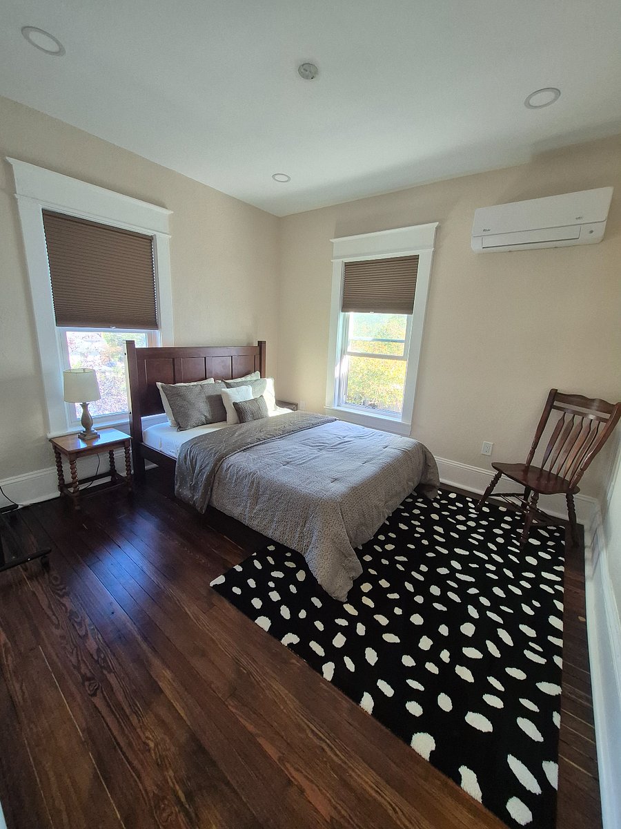 Sunny Queen bedroom with new memory foam mattress, personal mini-split and black out blinds.