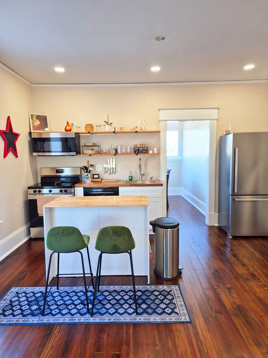 fully equipped large kitchen with bonus sunroom for dining and working