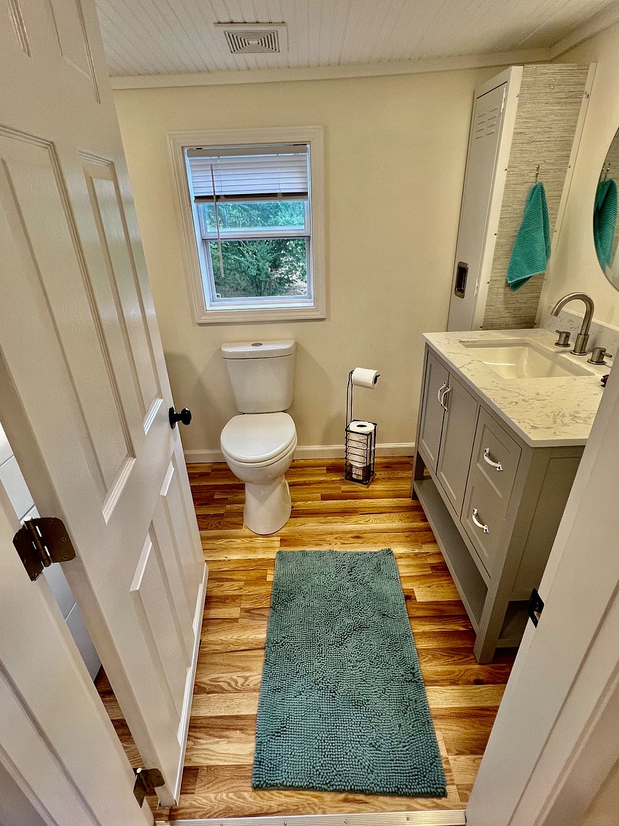 Half bath washroom with utility lockers