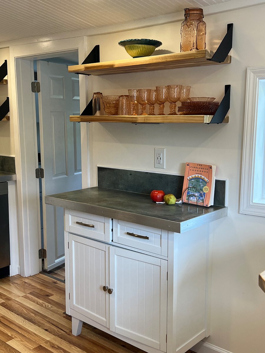 Kitchen prep area, glassware above