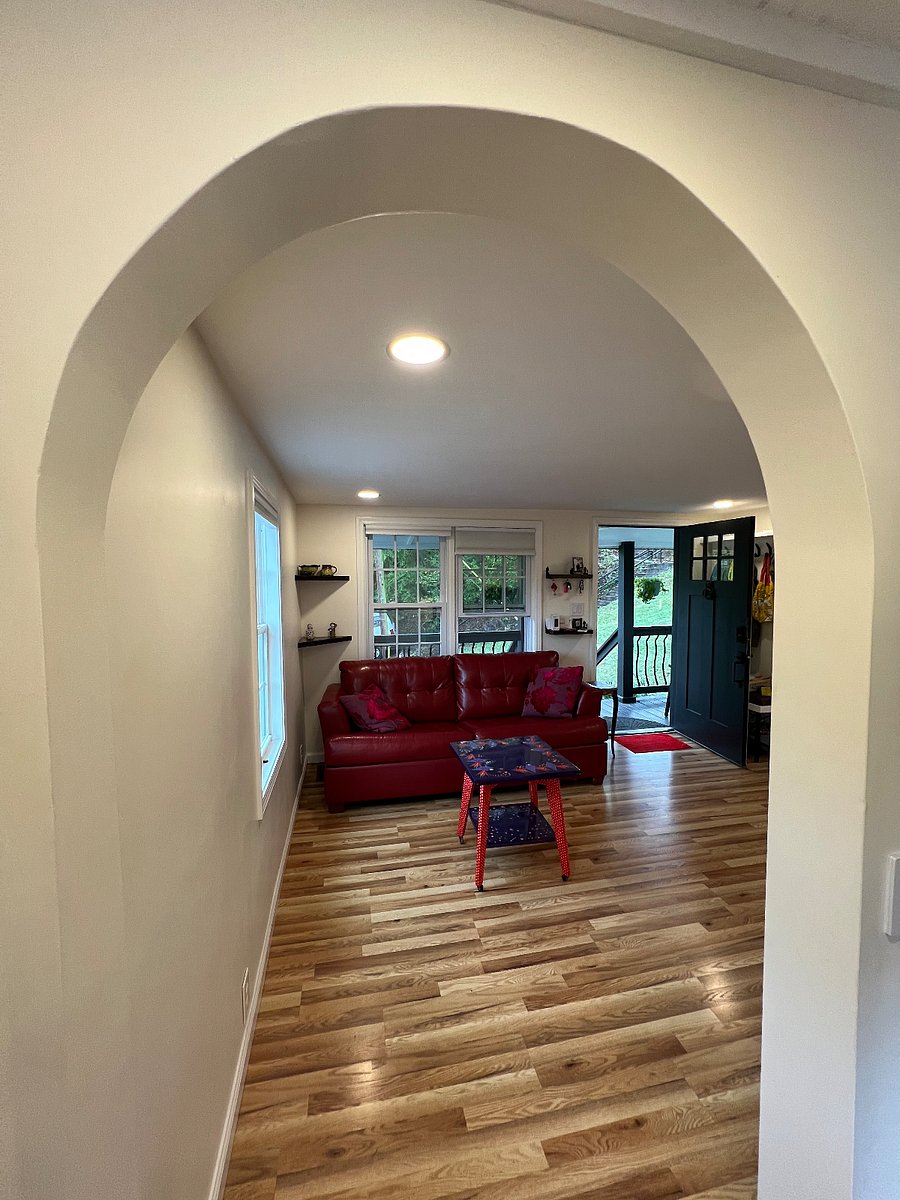 Archway leads to bistro dining/work area