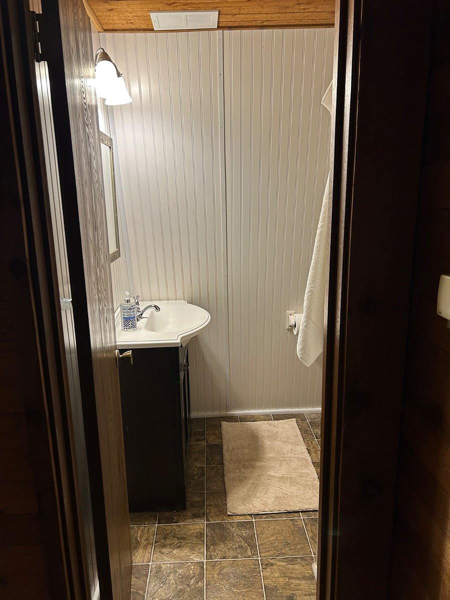 Bathroom: Looking through the bathroom door at the vanity