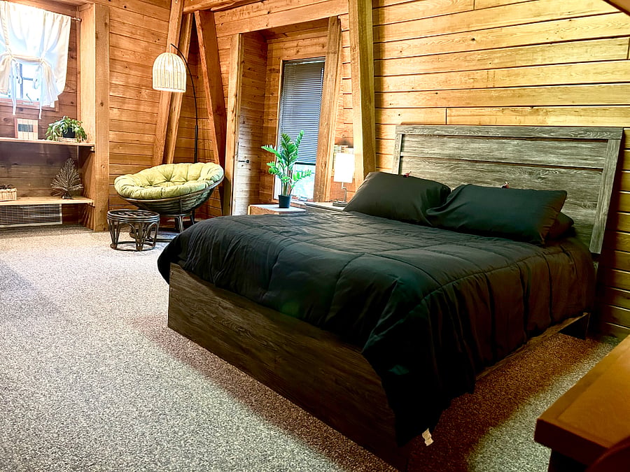 Bedroom: Memory foam queen bed and cozy papasan chair