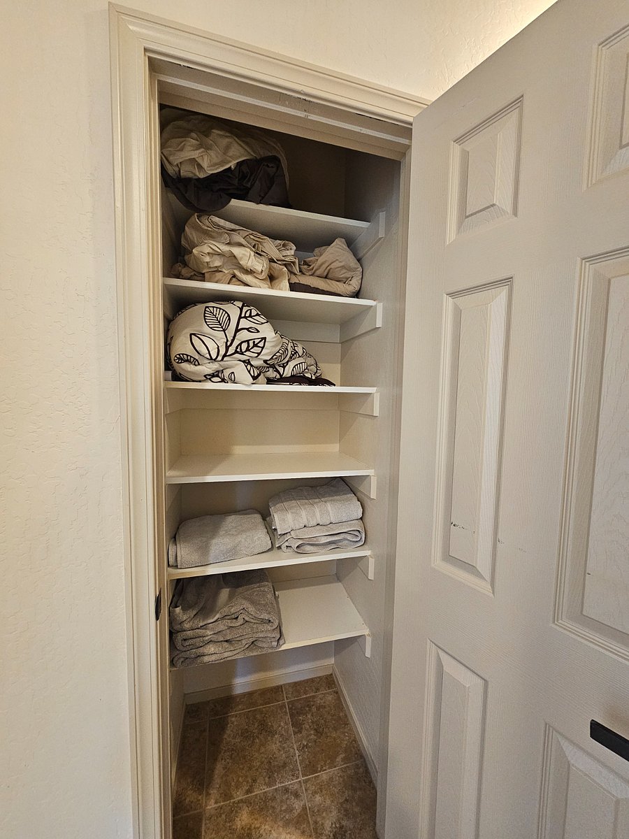 Linen closet toward guest rooms