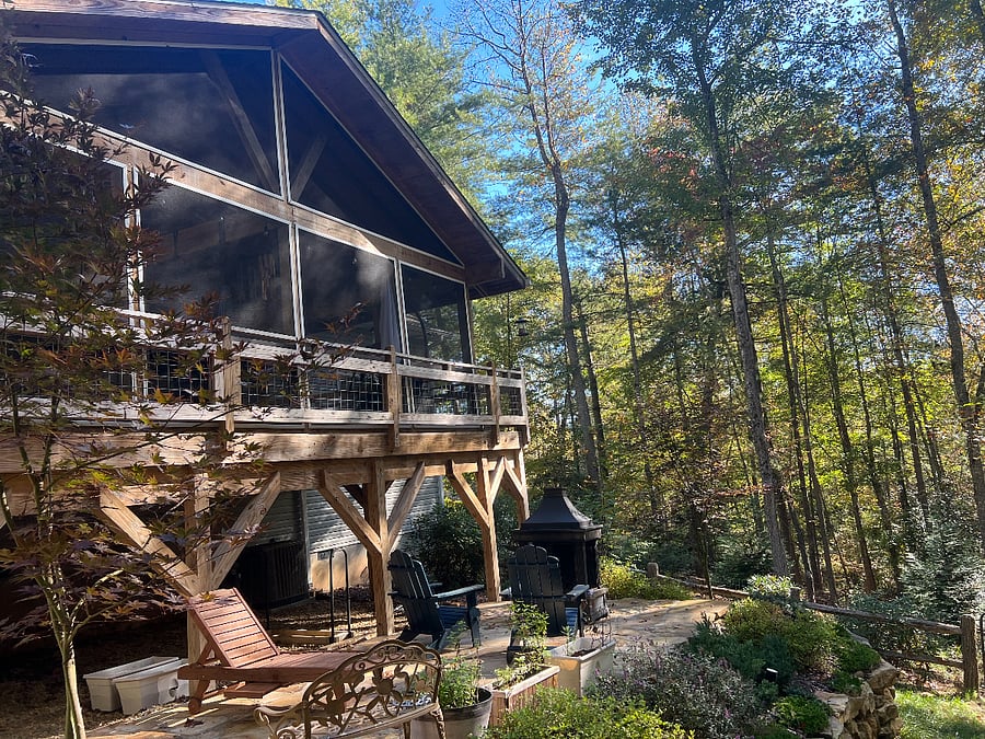 View of back deck from fenced yard