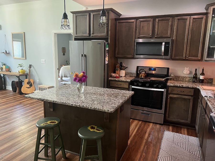 Kitchen with granite countertops and gas range