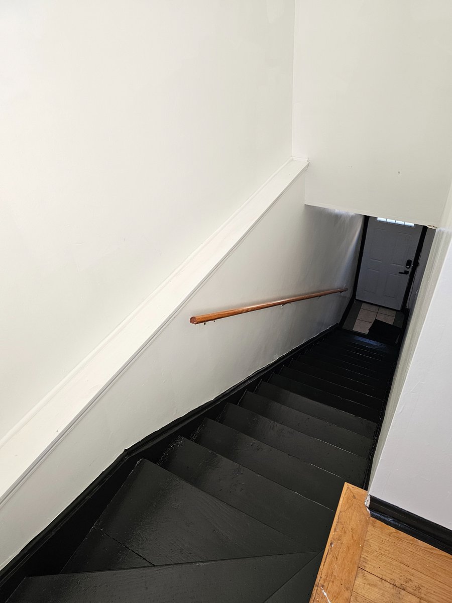 Stairs leading up to the 2nd floor apartment.