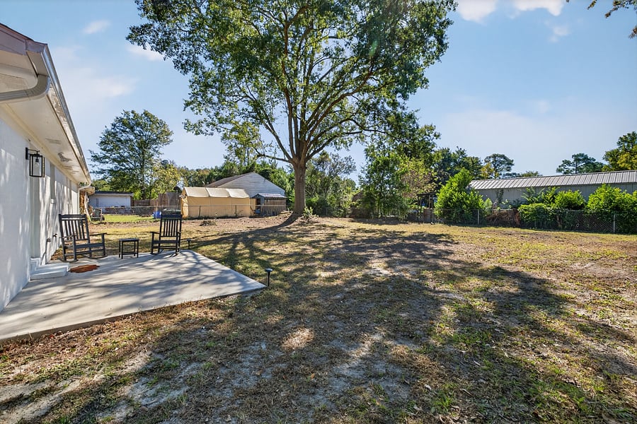 Large backyard with patio