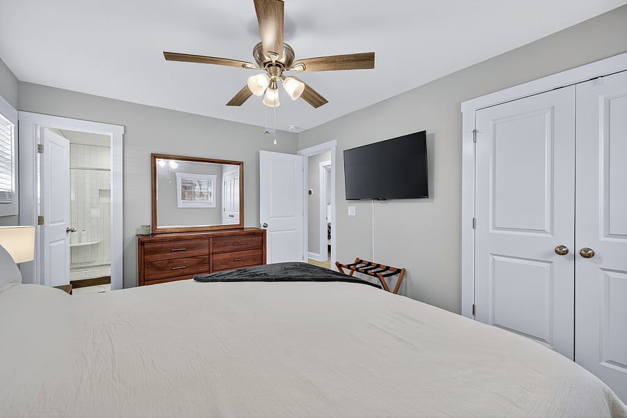 Primary bedroom with Roku TV