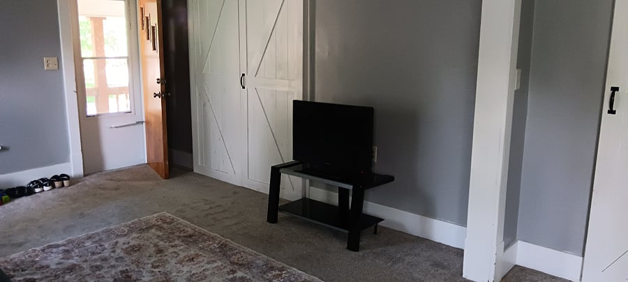 Living room and door to bedroom