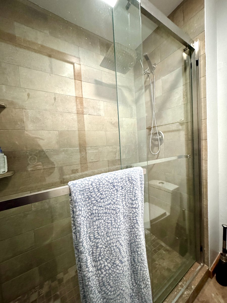 Primary shower with rain head.