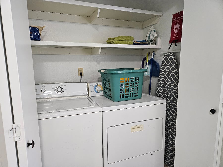 Laundry amenities including a full capacity washer and dryer, iron and full size ironing board.
