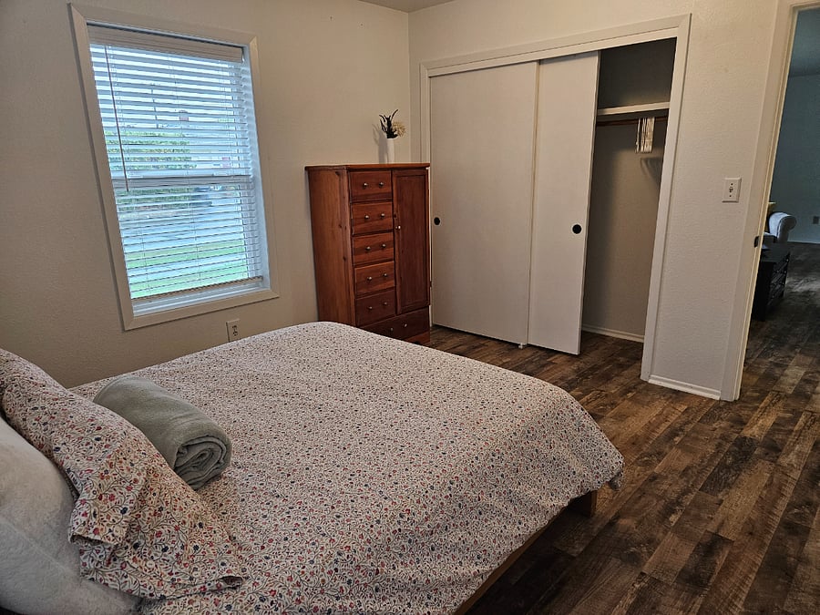 Tall dresser and ample closet space