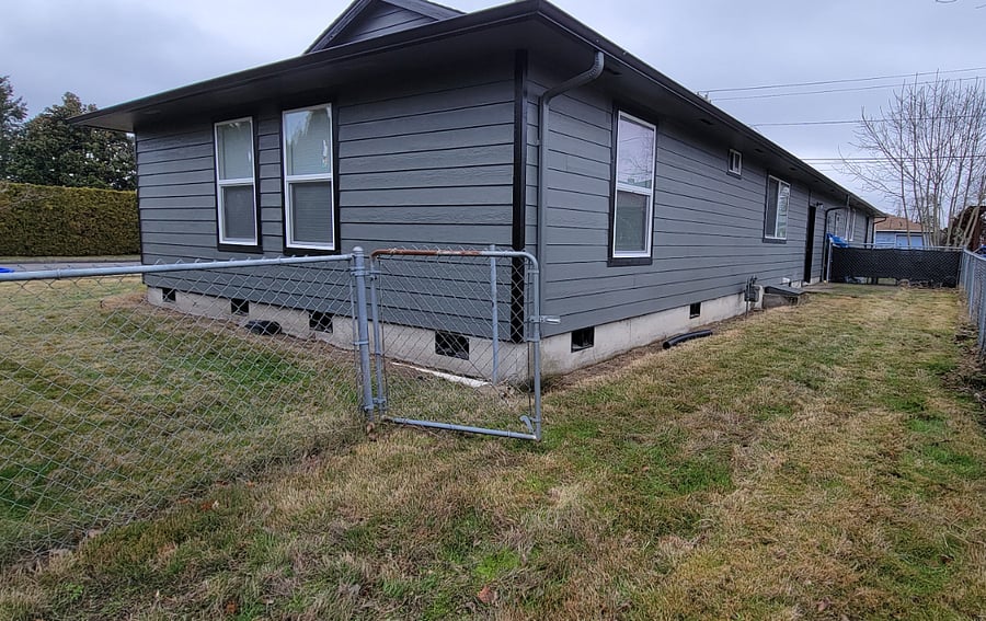 A fenced in back yard for little ones to play.