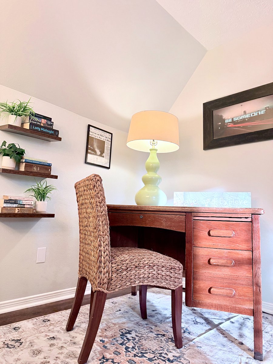 Dedicated workspace boasts a 100-year-old teacher's desk salvaged from an Iowa schoolhouse. Fast 1000 Mbps WiFi included!