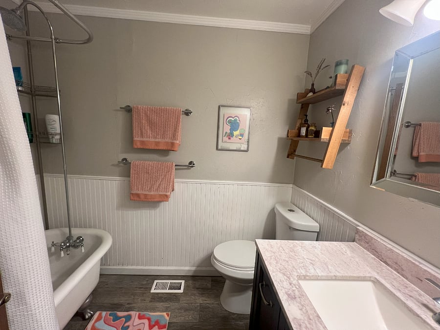 Full bathroom with clawfoot tub