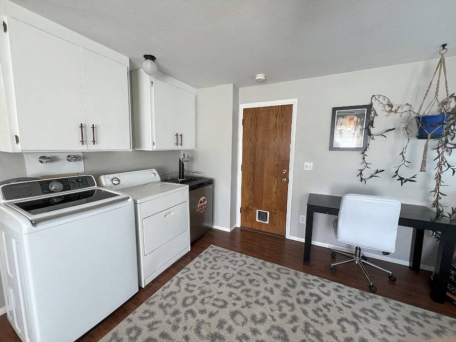 Washer & Dryer with storage available above.