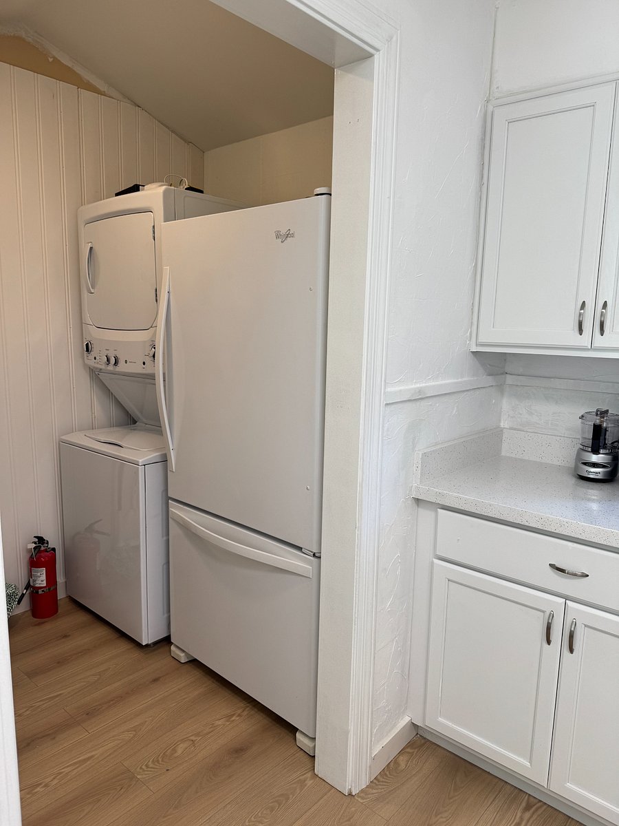 Washer/Dryer and Refrigerator, iron, ironing board, step stool, laundry soap, storage shelf