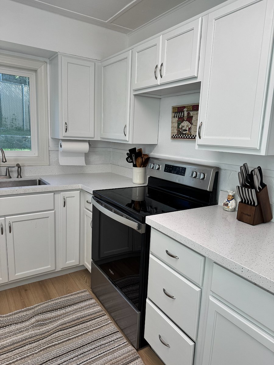 Kitchen with new quartz countertops, deep sink and sprayer