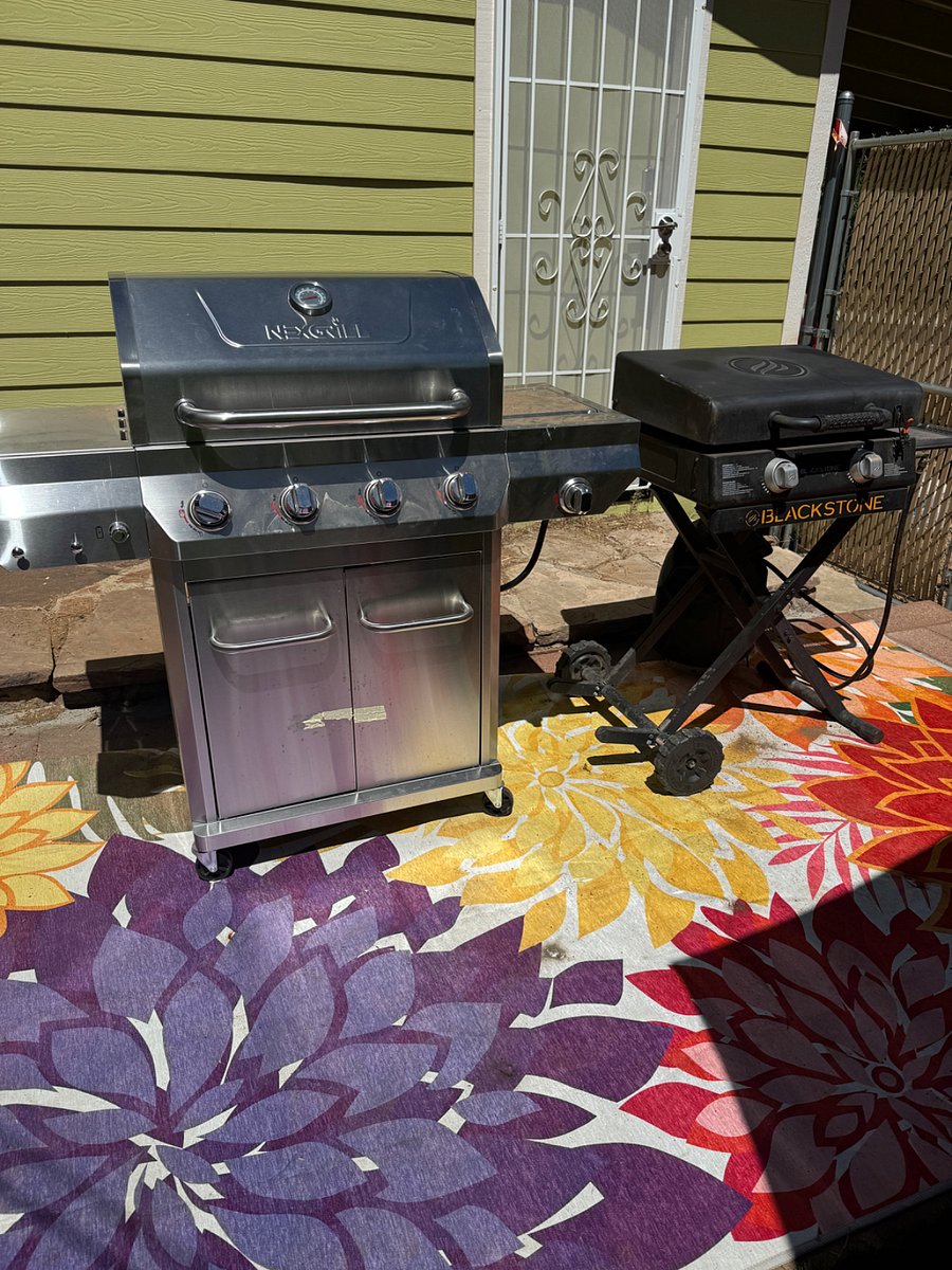 BBQ grill and flattop griddle with 2 propane tanks