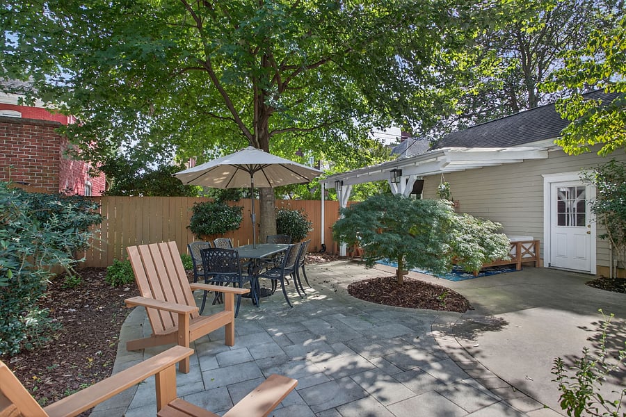 Cozy outdoor patio with dining and LR seating and TV
