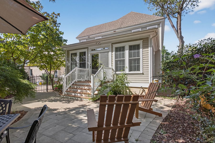 Cozy outdoor patio with dining and LR seating and TV