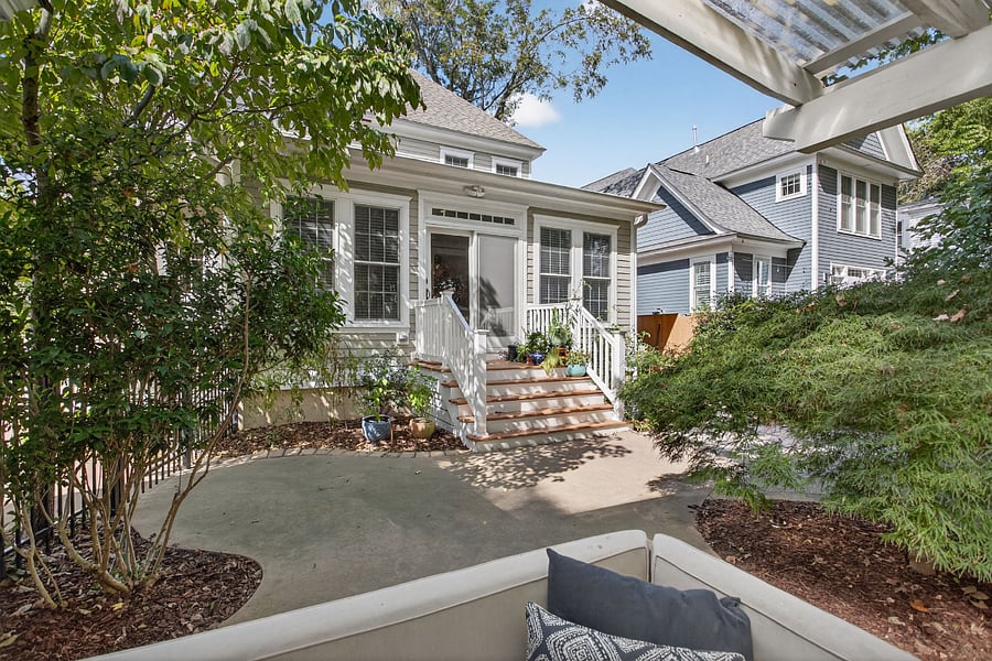 Cozy outdoor patio with dining and LR seating and TV