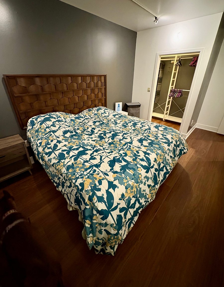 View across the VERY comfortable king size bed, looking towards the smallish, but well appointed, walk-in closet.