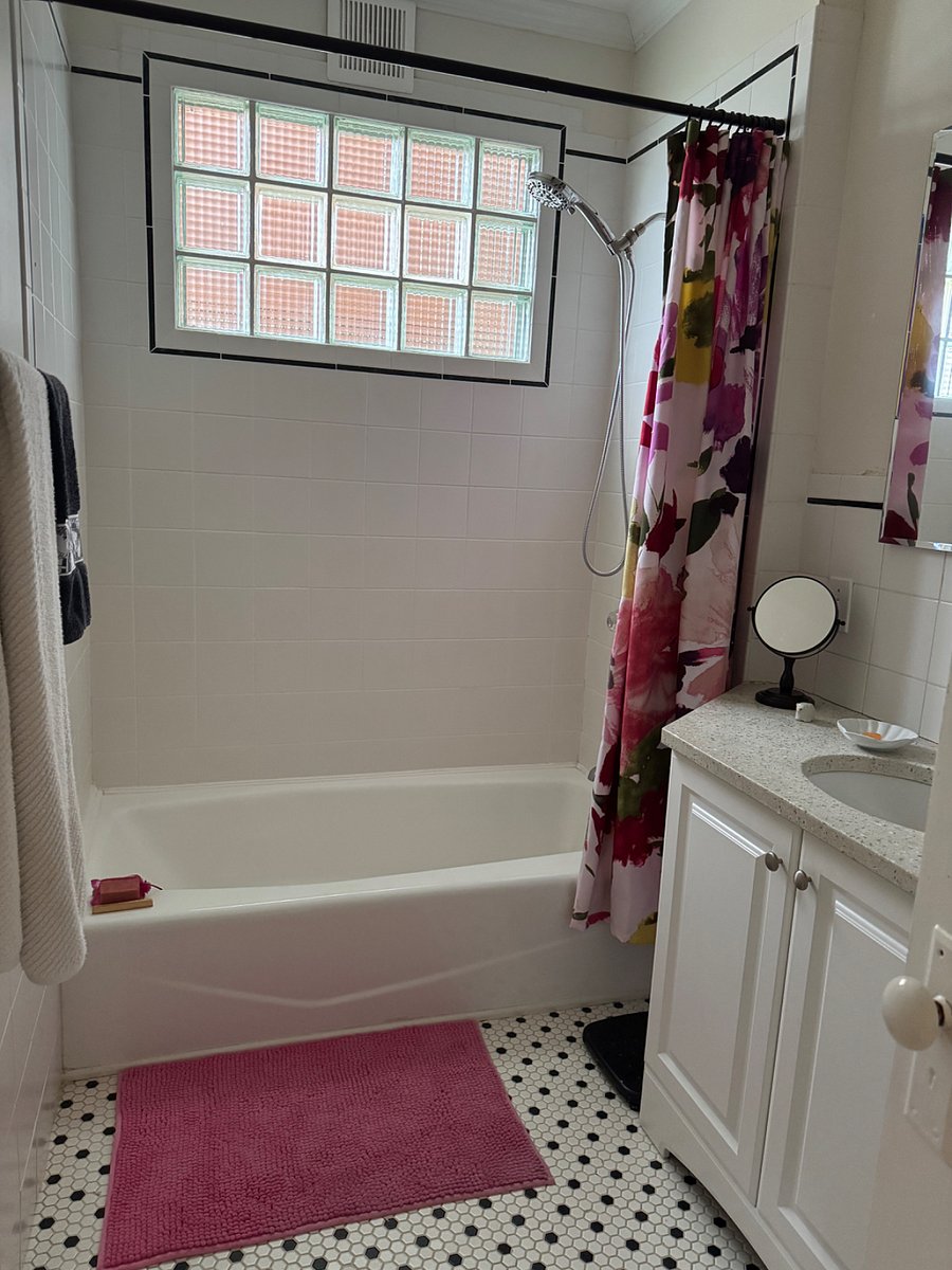 Bathroom with porcelain tub/shower (very nice water pressure)