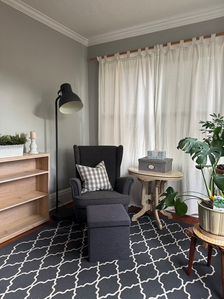 Cozy reading nook at opposite end of bedroom