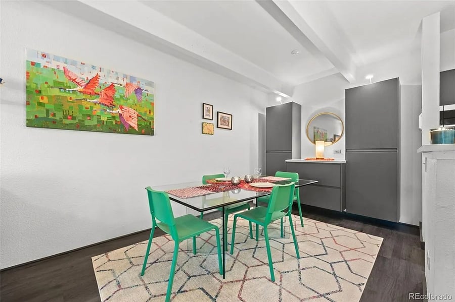 Dining room with built-in storage cabinets and serving counter for entertaining.