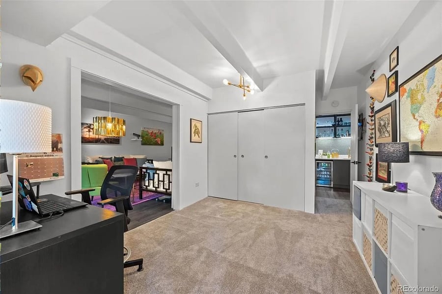 The office / second bedroom has ample storage in the closet and at the core of the unit with multiple access points.
