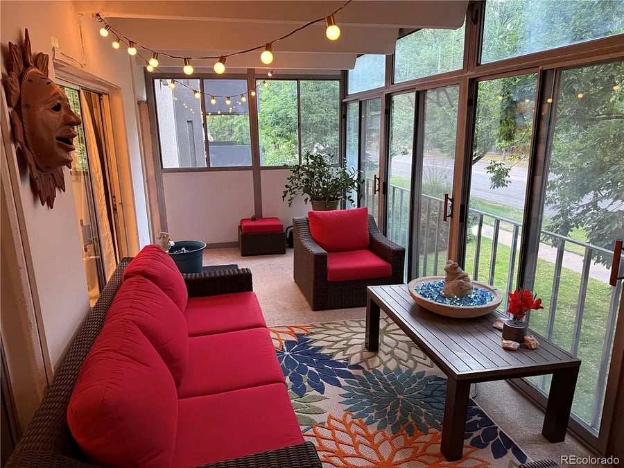 This three-season sun room is flooded with light and a wonderful spot for morning meditation and coffee.
