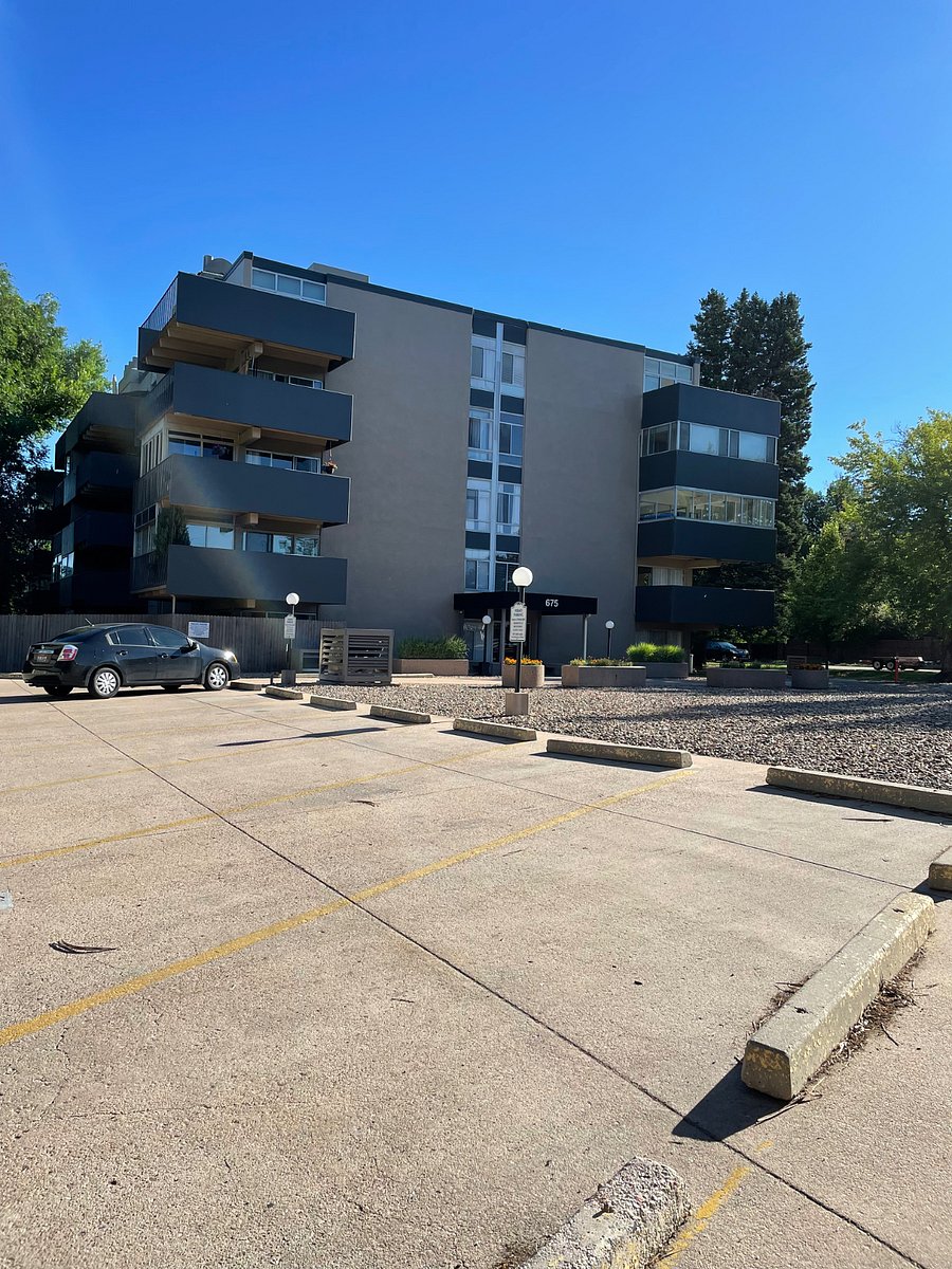 Guest parking outside the secure entrance. Visitors can dial a code in the entry way and the front door can be opened remotely by phone.