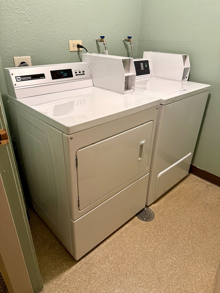Laundry rooms on each floor; this one is steps outside the unit and is $1.50/load.