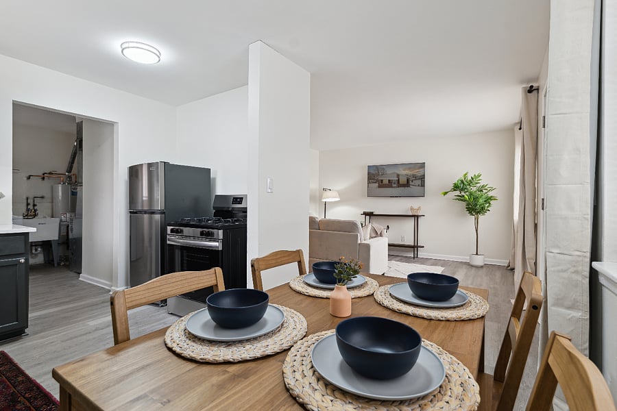 View of dining area, kitchen and living room