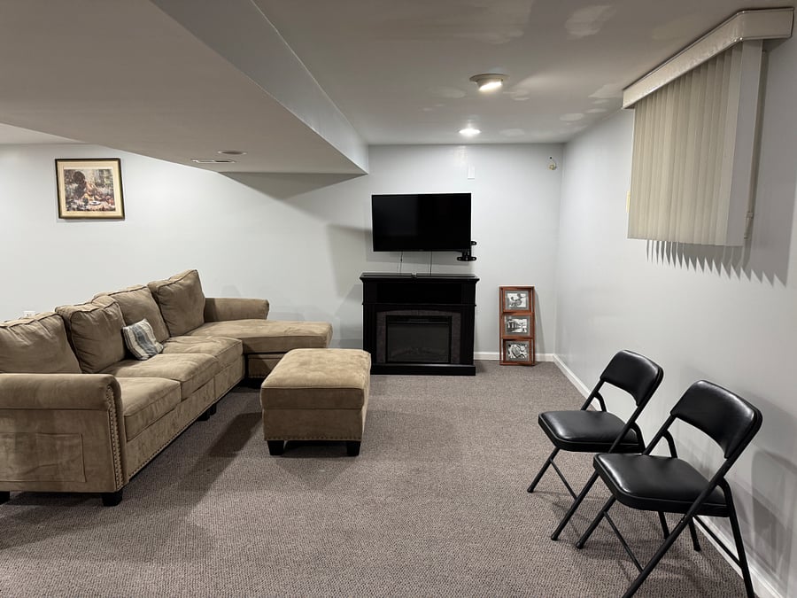 The basement has a TV as well as a space for games, reading, a separate office, and BONUS!!! a piano! 
