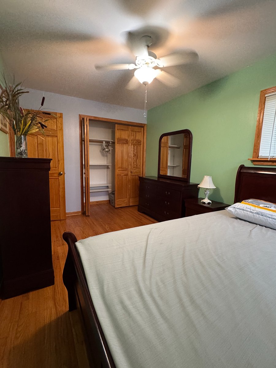 Second bedroom features a queen-size bed and lots of closet and drawer space.