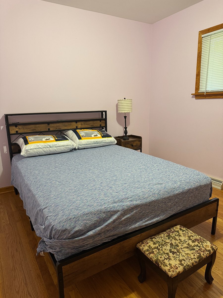 3rd bedroom with full-size bed, a closet that's larger than it looks, bureau and nightstand.