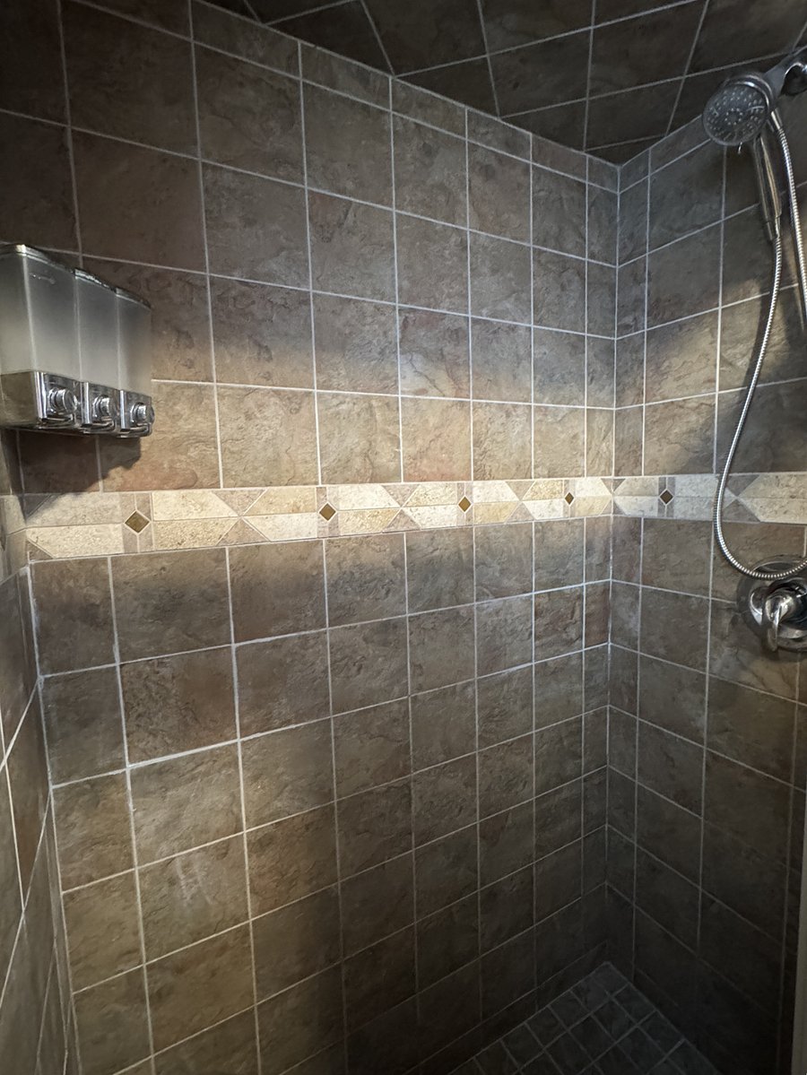Beautifully tiled en-suite shower.