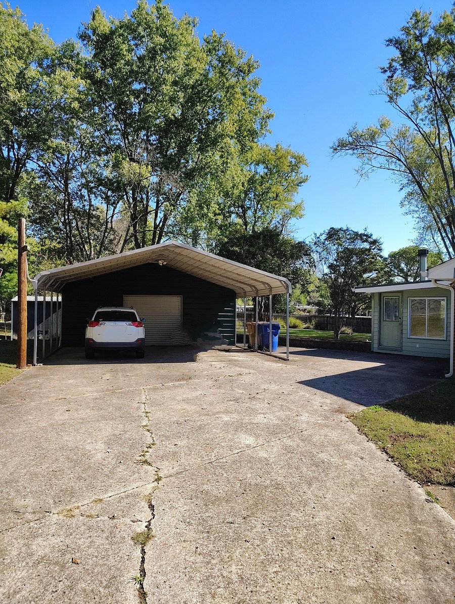 Your own dedicated covered parking space just steps away from the shared back entrance.