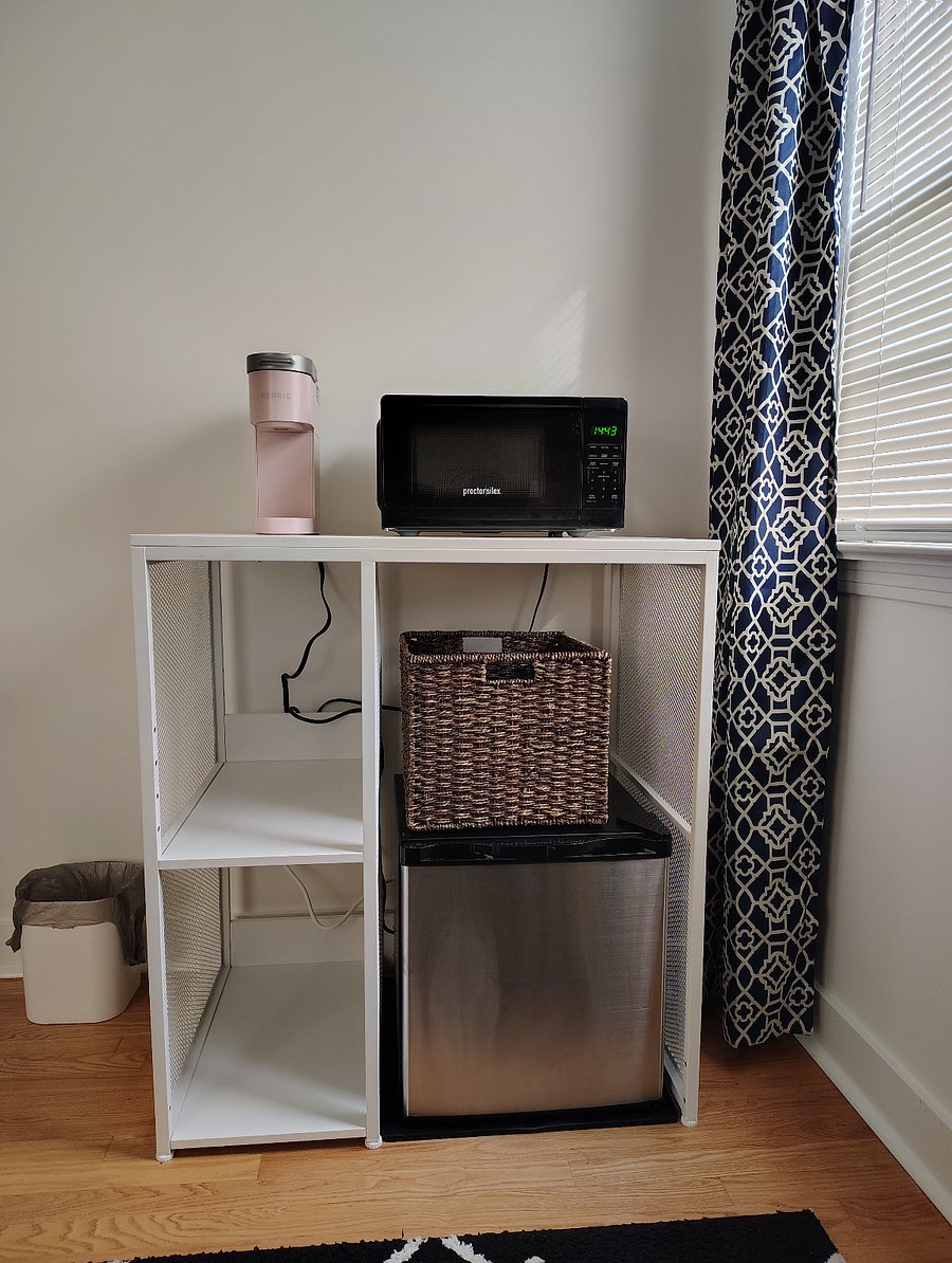 Keurig, microwave, and mini-fridge.