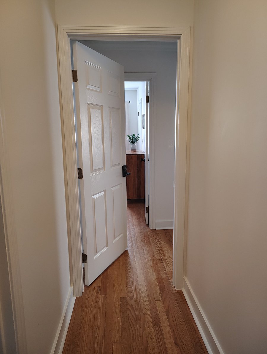Solid-core door with Kwikset SmartCode 917 keypad, enabling you to shut off the suite from the rest of the house for additional privacy and sound barrier.
