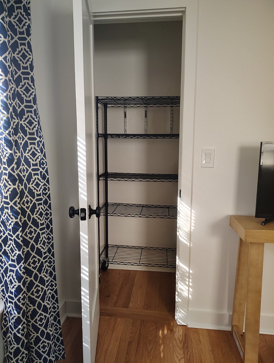 Closet with wire shelving for storage.