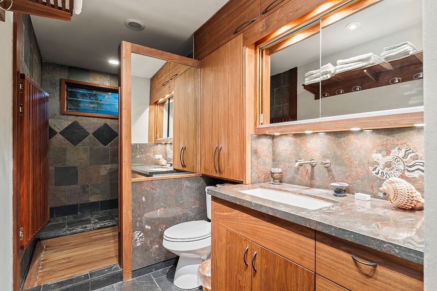 Bathroom with sink and shower entrance