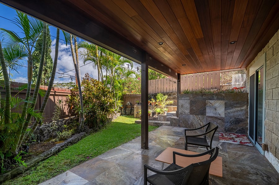 Back Lanai with sliding glass doors connecting to bedroom