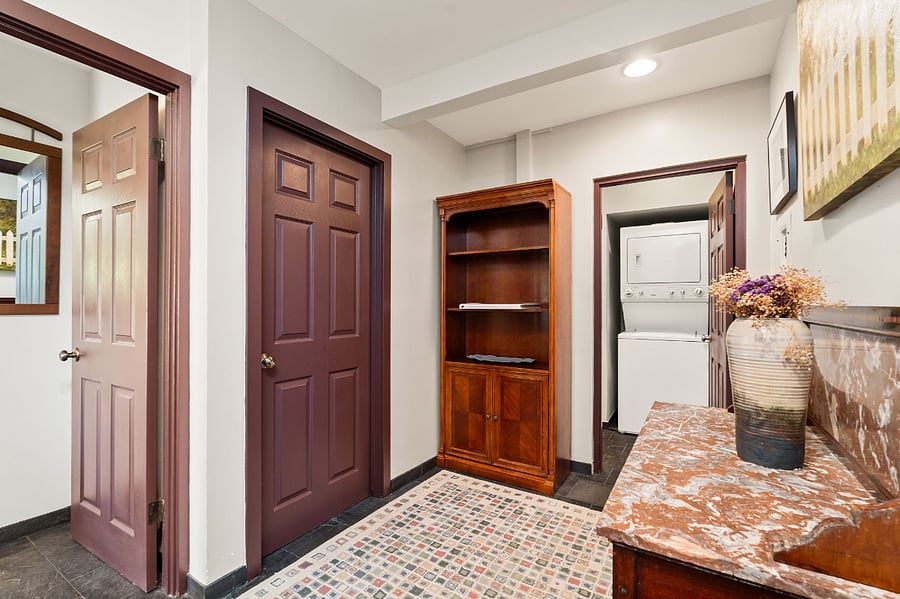 Space between rooms showing Entry to Bathroom, Washer/Dryer