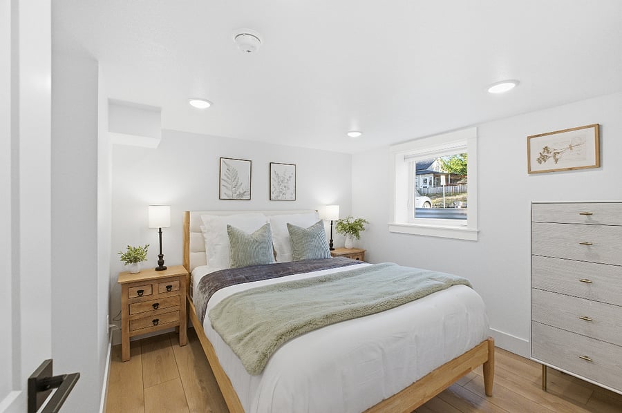 North bedroom. Queen bed. Large window lets in plenty of light.