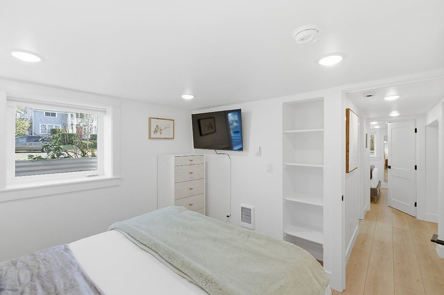 North bedroom. Queen bed. Large window lets in plenty of light.